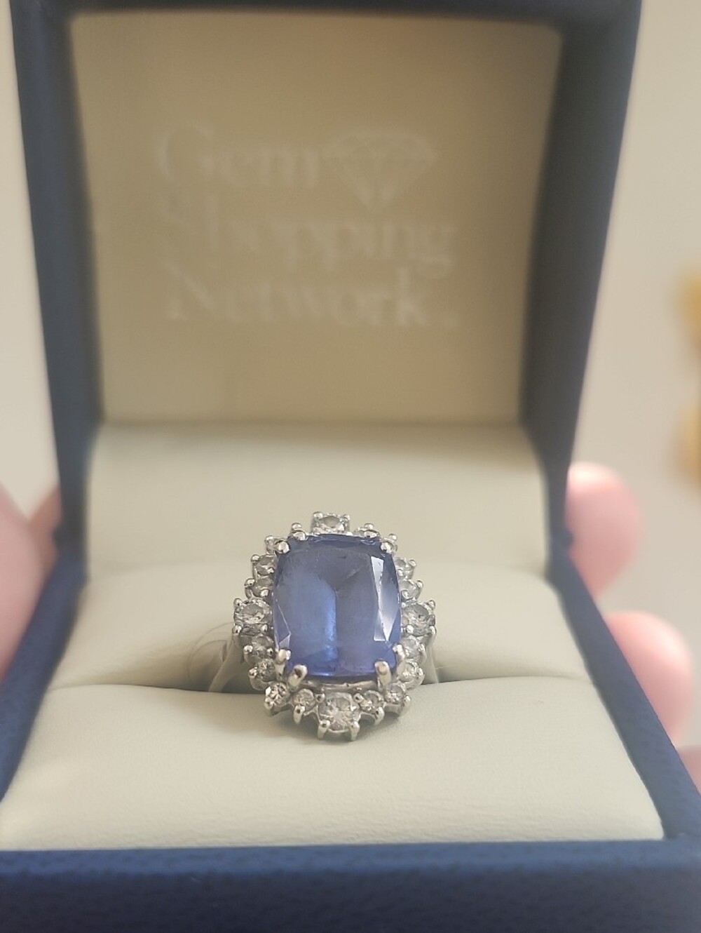 Tanzanite And Diamond Halo Ring